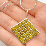 Twenty Five Small Square Cut Baltic Amber Pendant in Diamond Shape with Sterling Silver Strand - 99