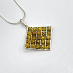 Twenty Five Small Square Cut Baltic Amber Pendant in Diamond Shape with Sterling Silver Strand - 99